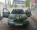 Зеленый Опель Астра, объемом двигателя 1.39 л и пробегом 330 тыс. км за 1800 $, фото 1 на Automoto.ua