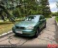 Зеленый Опель Астра, объемом двигателя 1.4 л и пробегом 300 тыс. км за 2350 $, фото 1 на Automoto.ua