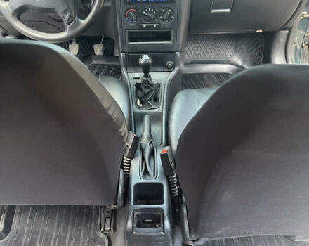 Зеленый Опель Астра, объемом двигателя 1.39 л и пробегом 320 тыс. км за 3100 $, фото 4 на Automoto.ua