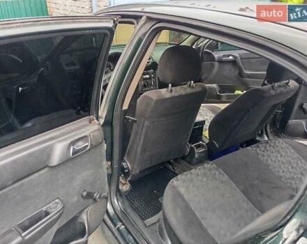 Зелений Опель Астра, об'ємом двигуна 1.6 л та пробігом 370 тис. км за 2600 $, фото 8 на Automoto.ua