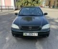 Зеленый Опель Астра, объемом двигателя 1.4 л и пробегом 188 тыс. км за 2808 $, фото 1 на Automoto.ua