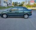 Зелений Опель Астра, об'ємом двигуна 1.6 л та пробігом 365 тис. км за 4350 $, фото 3 на Automoto.ua