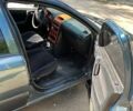 Зеленый Опель Астра, объемом двигателя 1.4 л и пробегом 210 тыс. км за 2000 $, фото 1 на Automoto.ua