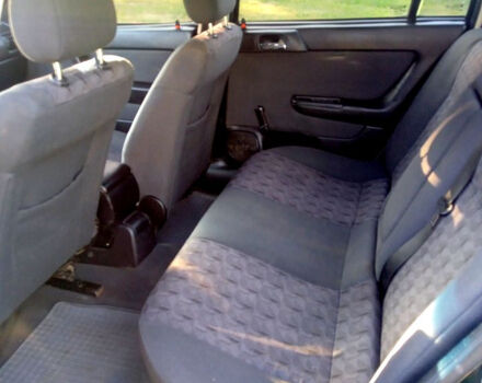 Зеленый Опель Астра, объемом двигателя 1.6 л и пробегом 167 тыс. км за 2350 $, фото 8 на Automoto.ua