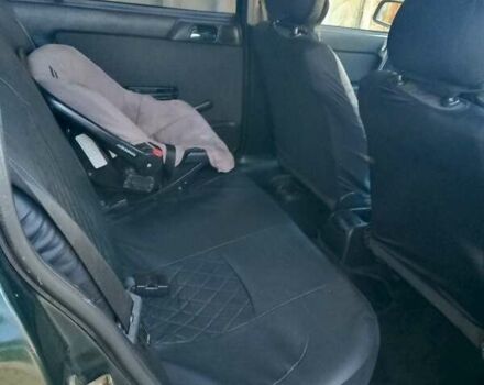 Зелений Опель Астра, об'ємом двигуна 1.39 л та пробігом 235 тис. км за 2900 $, фото 3 на Automoto.ua