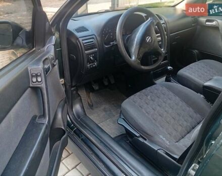 Зеленый Опель Астра, объемом двигателя 1.6 л и пробегом 260 тыс. км за 3000 $, фото 6 на Automoto.ua