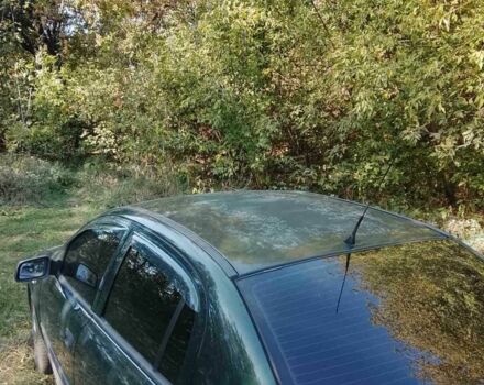 Зеленый Опель Астра, объемом двигателя 1.6 л и пробегом 320 тыс. км за 2043 $, фото 8 на Automoto.ua