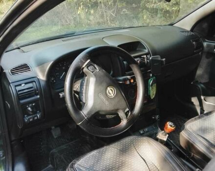 Зеленый Опель Астра, объемом двигателя 1.6 л и пробегом 320 тыс. км за 2043 $, фото 3 на Automoto.ua