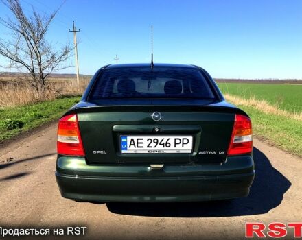 Зелений Опель Астра, об'ємом двигуна 1.4 л та пробігом 210 тис. км за 3100 $, фото 5 на Automoto.ua