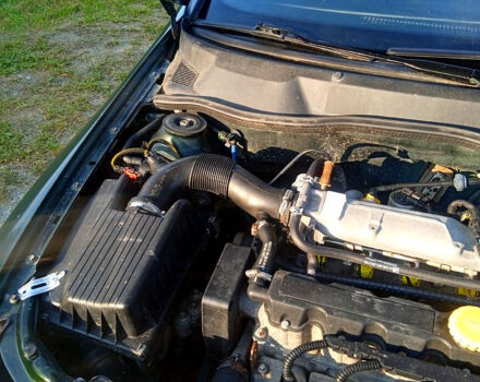 Зеленый Опель Астра, объемом двигателя 1.6 л и пробегом 167 тыс. км за 2350 $, фото 11 на Automoto.ua