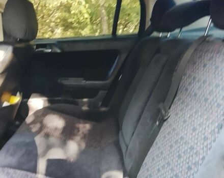 Зеленый Опель Астра, объемом двигателя 1.6 л и пробегом 320 тыс. км за 2043 $, фото 2 на Automoto.ua