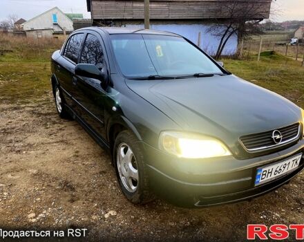 Зеленый Опель Астра, объемом двигателя 1.6 л и пробегом 231 тыс. км за 3350 $, фото 4 на Automoto.ua