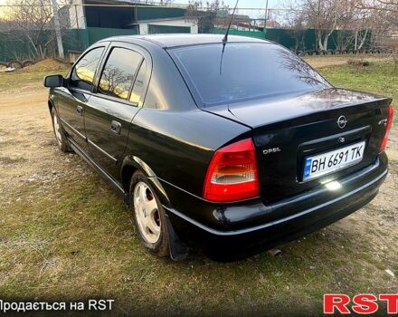Зеленый Опель Астра, объемом двигателя 1.6 л и пробегом 231 тыс. км за 3350 $, фото 3 на Automoto.ua