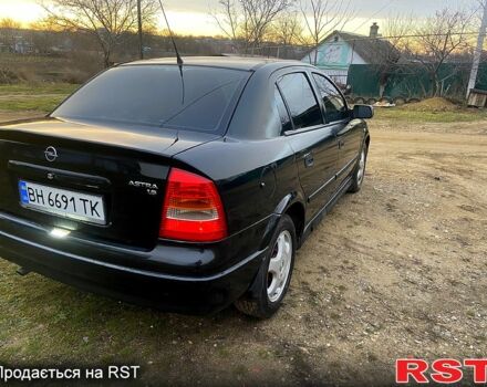 Зеленый Опель Астра, объемом двигателя 1.6 л и пробегом 231 тыс. км за 3350 $, фото 2 на Automoto.ua