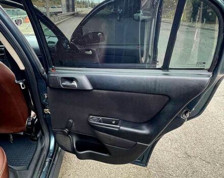 Зеленый Опель Астра, объемом двигателя 1.4 л и пробегом 235 тыс. км за 3000 $, фото 7 на Automoto.ua