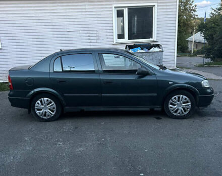 Зеленый Опель Астра, объемом двигателя 1.4 л и пробегом 350 тыс. км за 1999 $, фото 4 на Automoto.ua