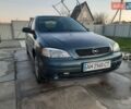 Зеленый Опель Астра, объемом двигателя 1.4 л и пробегом 301 тыс. км за 2700 $, фото 1 на Automoto.ua