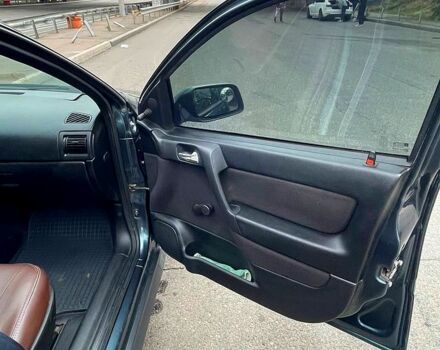 Зеленый Опель Астра, объемом двигателя 1.4 л и пробегом 235 тыс. км за 3000 $, фото 6 на Automoto.ua