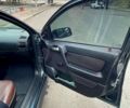 Зеленый Опель Астра, объемом двигателя 1.4 л и пробегом 235 тыс. км за 3000 $, фото 6 на Automoto.ua