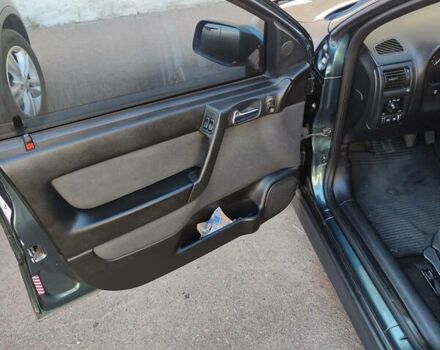 Зеленый Опель Астра, объемом двигателя 1.6 л и пробегом 230 тыс. км за 3500 $, фото 12 на Automoto.ua