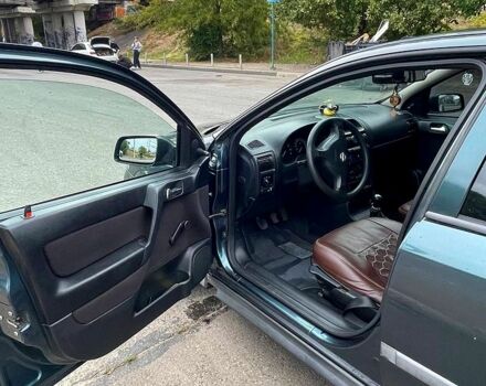 Зеленый Опель Астра, объемом двигателя 1.4 л и пробегом 235 тыс. км за 3000 $, фото 5 на Automoto.ua