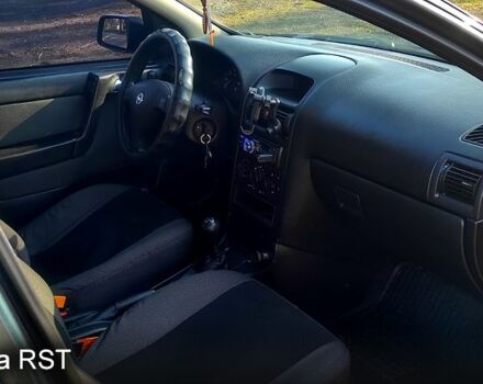 Зеленый Опель Астра, объемом двигателя 1.6 л и пробегом 310 тыс. км за 3200 $, фото 11 на Automoto.ua