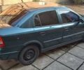 Зеленый Опель Астра, объемом двигателя 1.4 л и пробегом 320 тыс. км за 3400 $, фото 1 на Automoto.ua