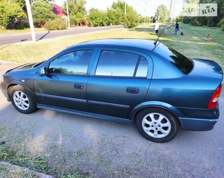 Зеленый Опель Астра, объемом двигателя 1.6 л и пробегом 230 тыс. км за 3500 $, фото 6 на Automoto.ua