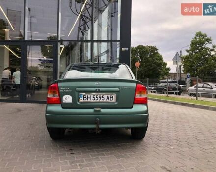 Зелений Опель Астра, об'ємом двигуна 1.4 л та пробігом 200 тис. км за 4199 $, фото 6 на Automoto.ua