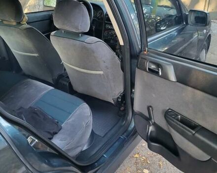 Зеленый Опель Астра, объемом двигателя 1.6 л и пробегом 168 тыс. км за 4200 $, фото 12 на Automoto.ua