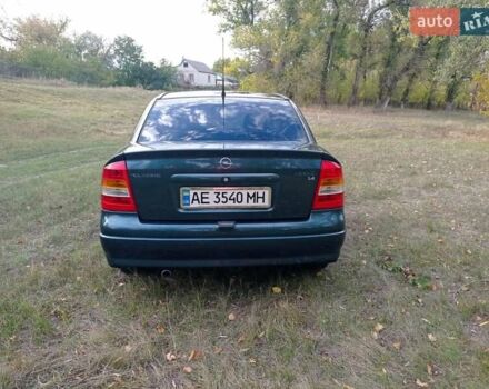 Зеленый Опель Астра, объемом двигателя 1.4 л и пробегом 190 тыс. км за 5600 $, фото 11 на Automoto.ua
