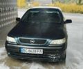 Зеленый Опель Астра, объемом двигателя 1.4 л и пробегом 297 тыс. км за 2100 $, фото 1 на Automoto.ua