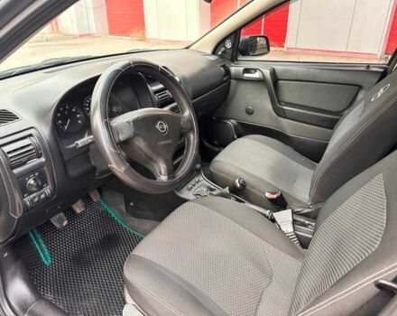 Зелений Опель Астра, об'ємом двигуна 1.4 л та пробігом 274 тис. км за 3800 $, фото 13 на Automoto.ua