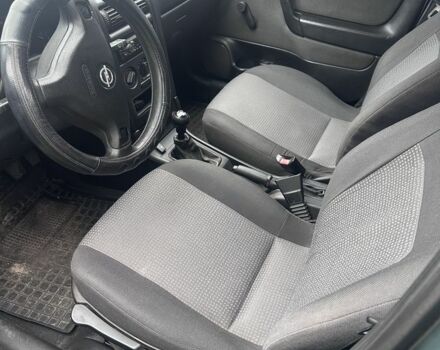 Зелений Опель Астра, об'ємом двигуна 1.4 л та пробігом 400 тис. км за 2450 $, фото 7 на Automoto.ua