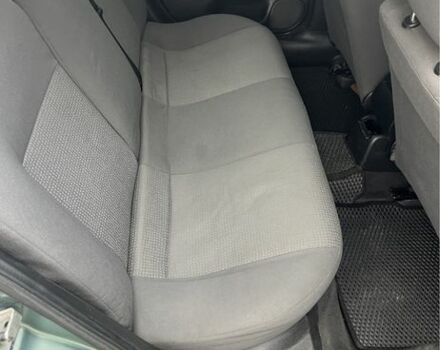 Зеленый Опель Астра, объемом двигателя 1.4 л и пробегом 350 тыс. км за 4100 $, фото 4 на Automoto.ua