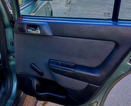 Зелений Опель Астра, об'ємом двигуна 1.4 л та пробігом 136 тис. км за 3150 $, фото 4 на Automoto.ua