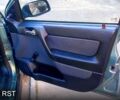 Зелений Опель Астра, об'ємом двигуна 1.4 л та пробігом 136 тис. км за 3150 $, фото 3 на Automoto.ua