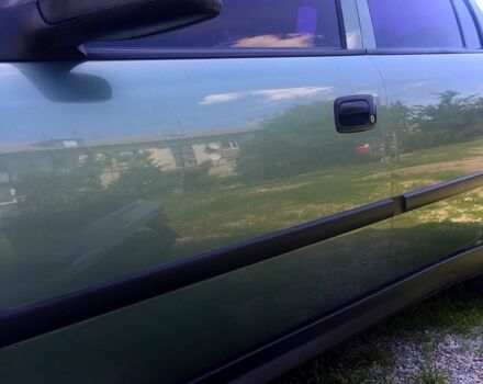 Зеленый Опель Астра, объемом двигателя 1.4 л и пробегом 156 тыс. км за 4500 $, фото 1 на Automoto.ua