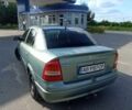 Зеленый Опель Астра, объемом двигателя 1.6 л и пробегом 228 тыс. км за 2700 $, фото 1 на Automoto.ua
