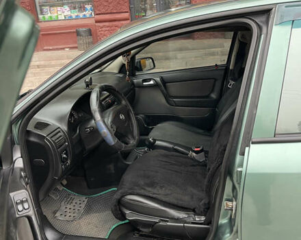 Зеленый Опель Астра, объемом двигателя 1.6 л и пробегом 260 тыс. км за 2350 $, фото 7 на Automoto.ua