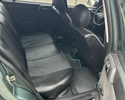 Зеленый Опель Астра, объемом двигателя 1.6 л и пробегом 260 тыс. км за 2350 $, фото 6 на Automoto.ua