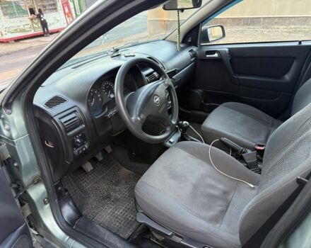 Зелений Опель Астра, об'ємом двигуна 1.4 л та пробігом 220 тис. км за 2499 $, фото 5 на Automoto.ua