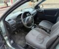 Зелений Опель Астра, об'ємом двигуна 1.4 л та пробігом 220 тис. км за 2499 $, фото 5 на Automoto.ua