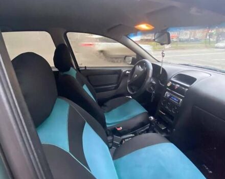 Зелений Опель Астра, об'ємом двигуна 1.39 л та пробігом 188 тис. км за 3342 $, фото 9 на Automoto.ua