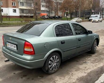 Зелений Опель Астра, об'ємом двигуна 1.39 л та пробігом 188 тис. км за 3342 $, фото 5 на Automoto.ua