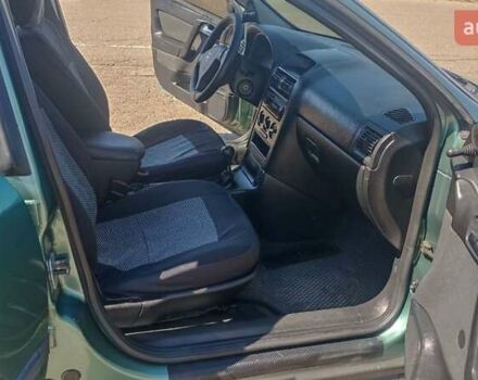 Зелений Опель Астра, об'ємом двигуна 1.39 л та пробігом 320 тис. км за 3400 $, фото 27 на Automoto.ua