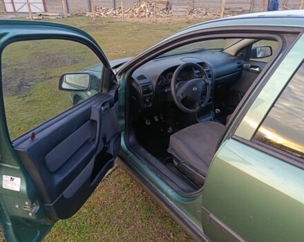 Зеленый Опель Астра, объемом двигателя 1.4 л и пробегом 360 тыс. км за 2550 $, фото 4 на Automoto.ua