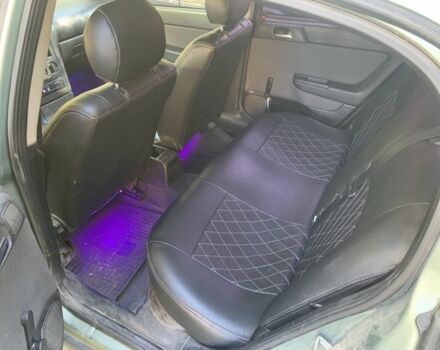 Зеленый Опель Астра, объемом двигателя 1.4 л и пробегом 187 тыс. км за 2450 $, фото 8 на Automoto.ua