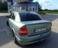 Зеленый Опель Астра, объемом двигателя 1.6 л и пробегом 228 тыс. км за 3300 $, фото 1 на Automoto.ua