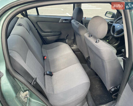 Зелений Опель Астра, об'ємом двигуна 1.4 л та пробігом 146 тис. км за 3800 $, фото 13 на Automoto.ua
